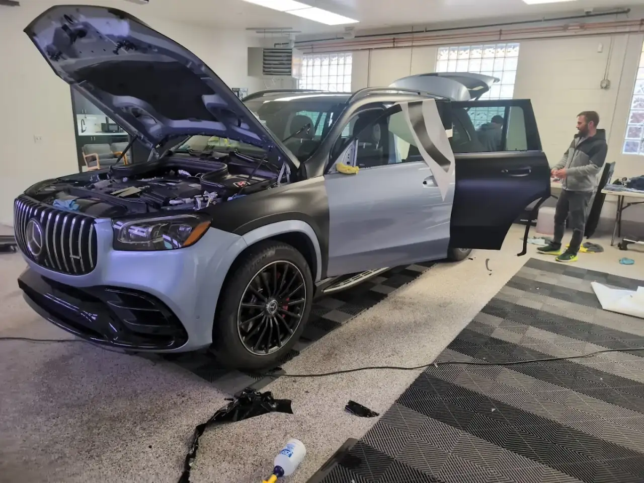 Paint protection film installation on a Mercedes GLS AMG at Dent, Hail & Detail in Denver